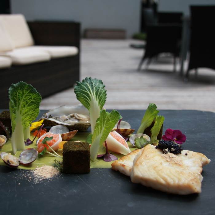 Gourmet dish on slate platter