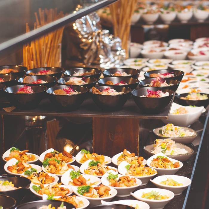 Filled buffet table at the spa resort Linsberg Asia