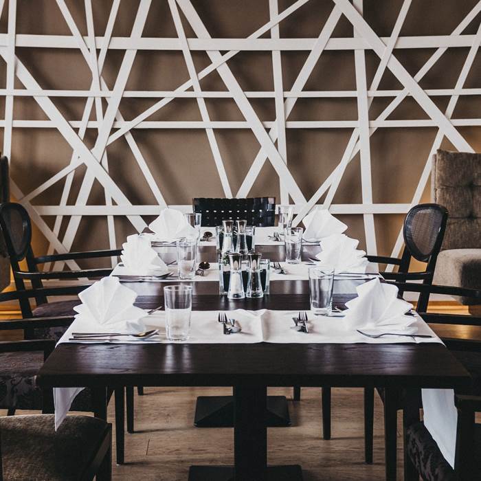 Tables set in the restaurant of the spa hotel Linsberg Asia