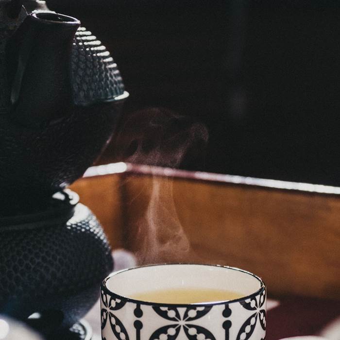 Cup with steaming tea