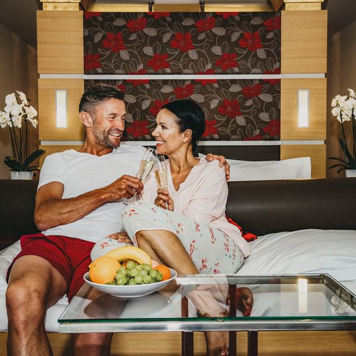 Couple in hotel room of resort Linsberg Asia